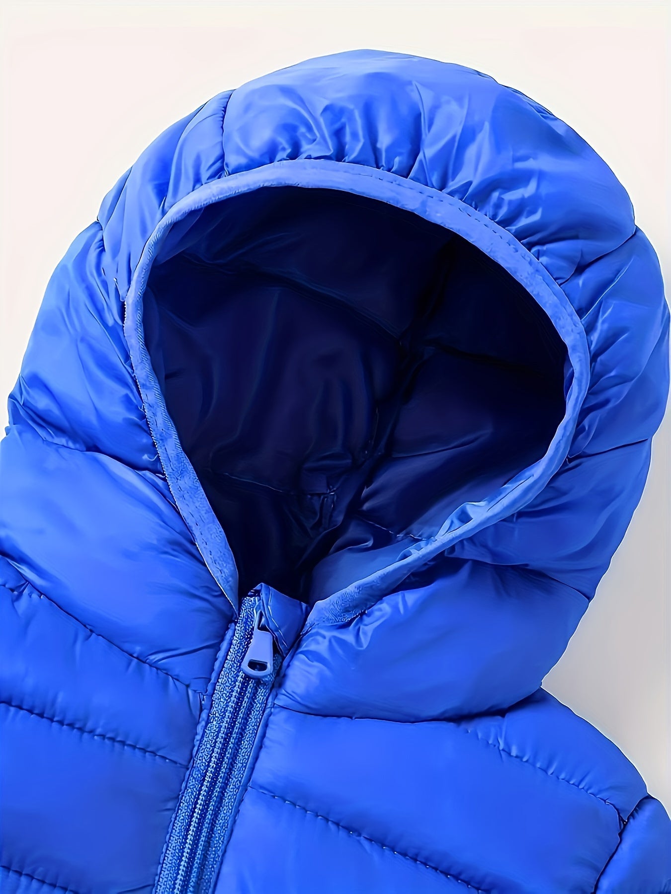 Classic boys' quilted jacket with hood, ideal for winter/autumn.